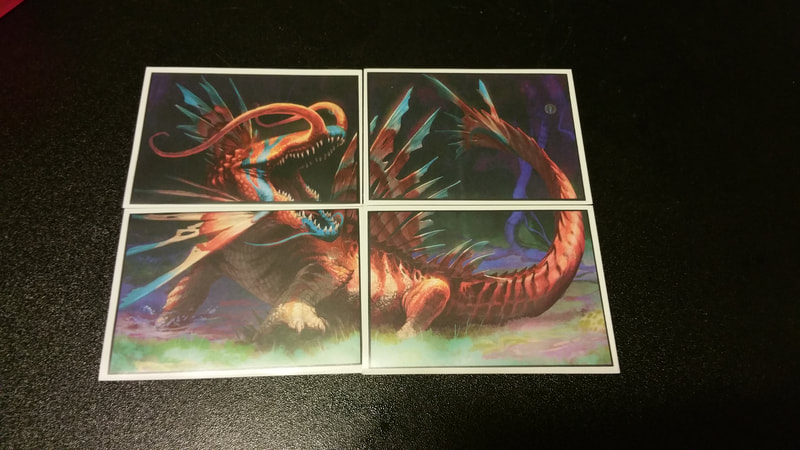 4 creature cards in a rectangle arrangement showing the creature discovered.
